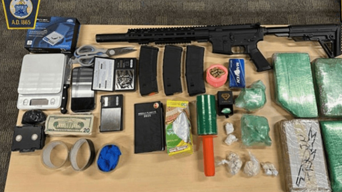 Pictured are items found on Leonardo Andujar Sanchez's person when he was arrested on December 27