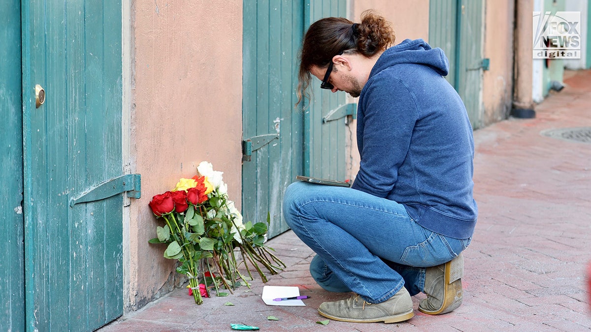 A memorial for those killed in the New Year’s Eve attack on Bourbon Street following the street’s reopening in New Orleans, Louisiana