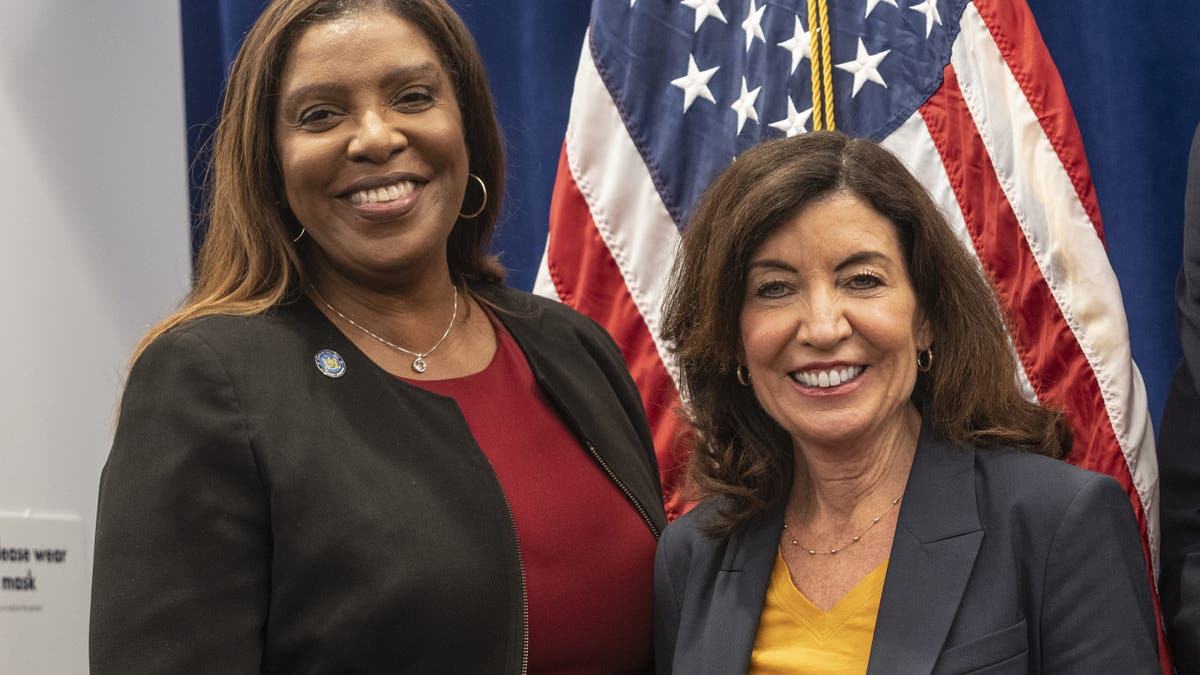 Letitia James with Gov. Kathy Hochul, U.S. flag behind them