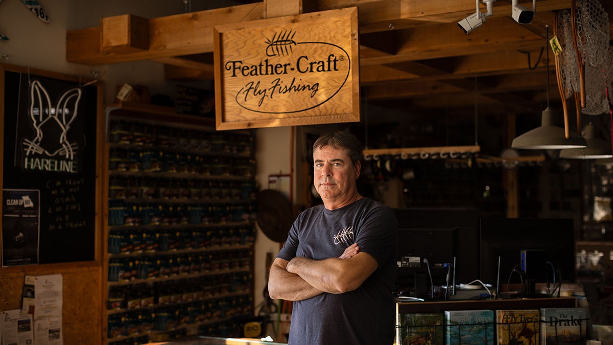 Bob Story stands inside his businesses, Feather-Craft Fly Fishing