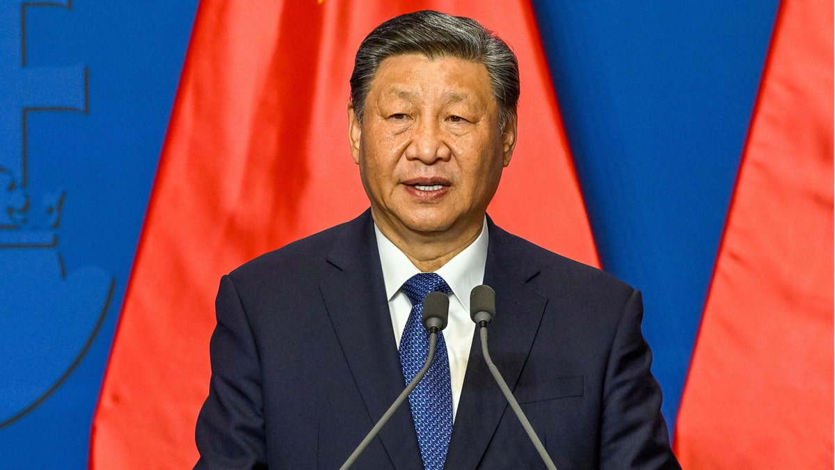 Xi Jinping speaks during press conference