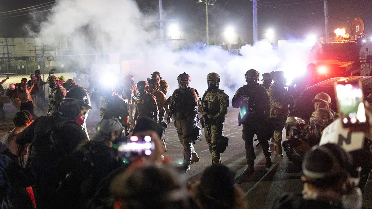 Authorities and anti-ICE protesters in Broadview, Illinois.