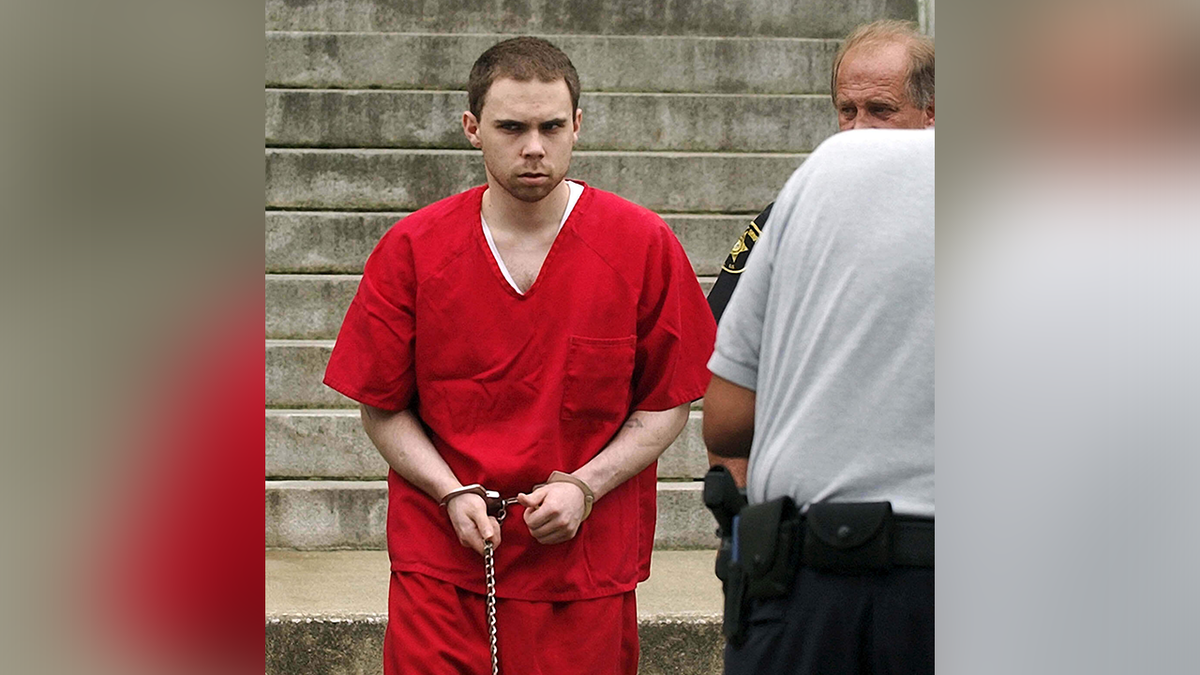 Stephen Corey Bryant is led to a Sumter-Lee Regional Detention Center van