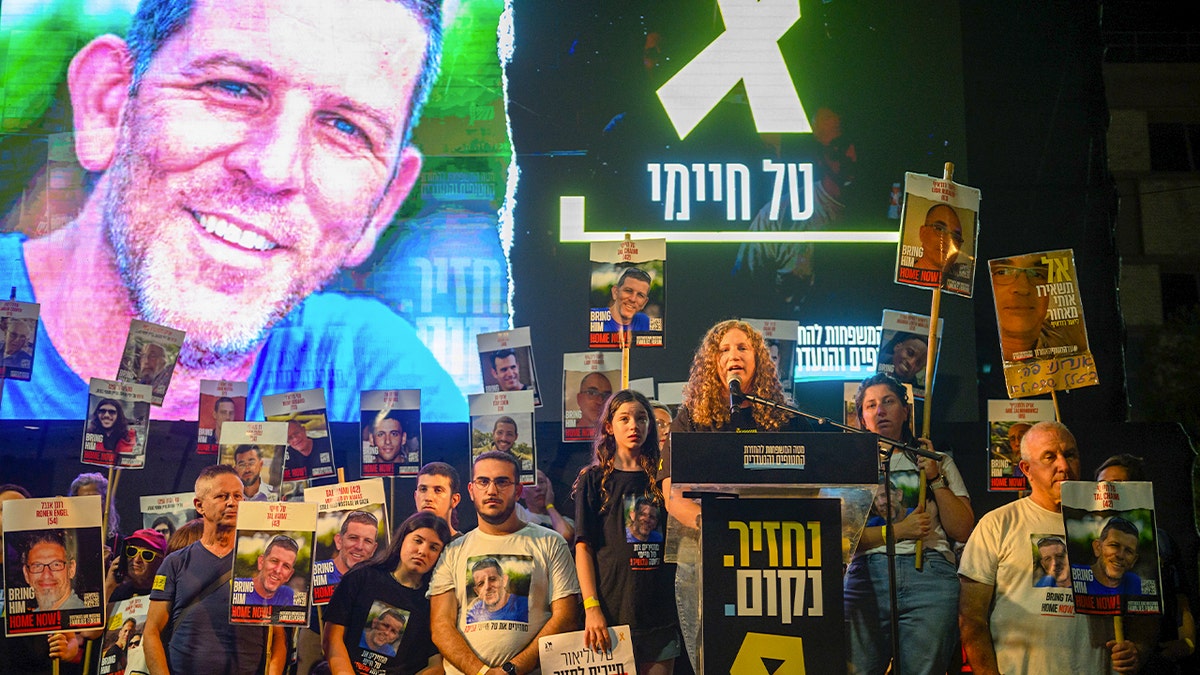 Ela Haimi, the wife of deceased hostage Tal Haimi, speaks at an event in Hostages Square