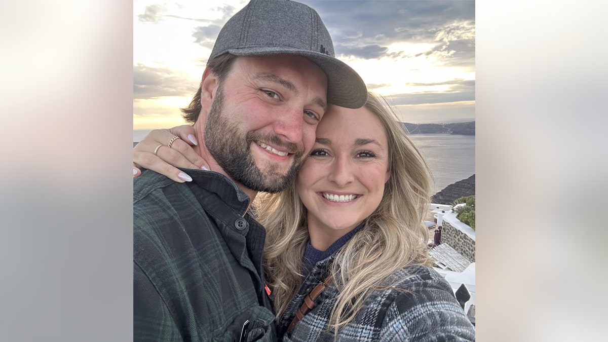 Rachel Dumovich and Brandon Dumovich pose for a picture.