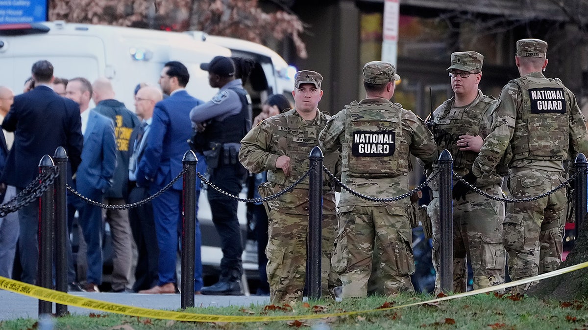 National Guard soldiers gather after two fellow troop members were shot, Wednesday, Nov. 26, 2025, in Washington. 