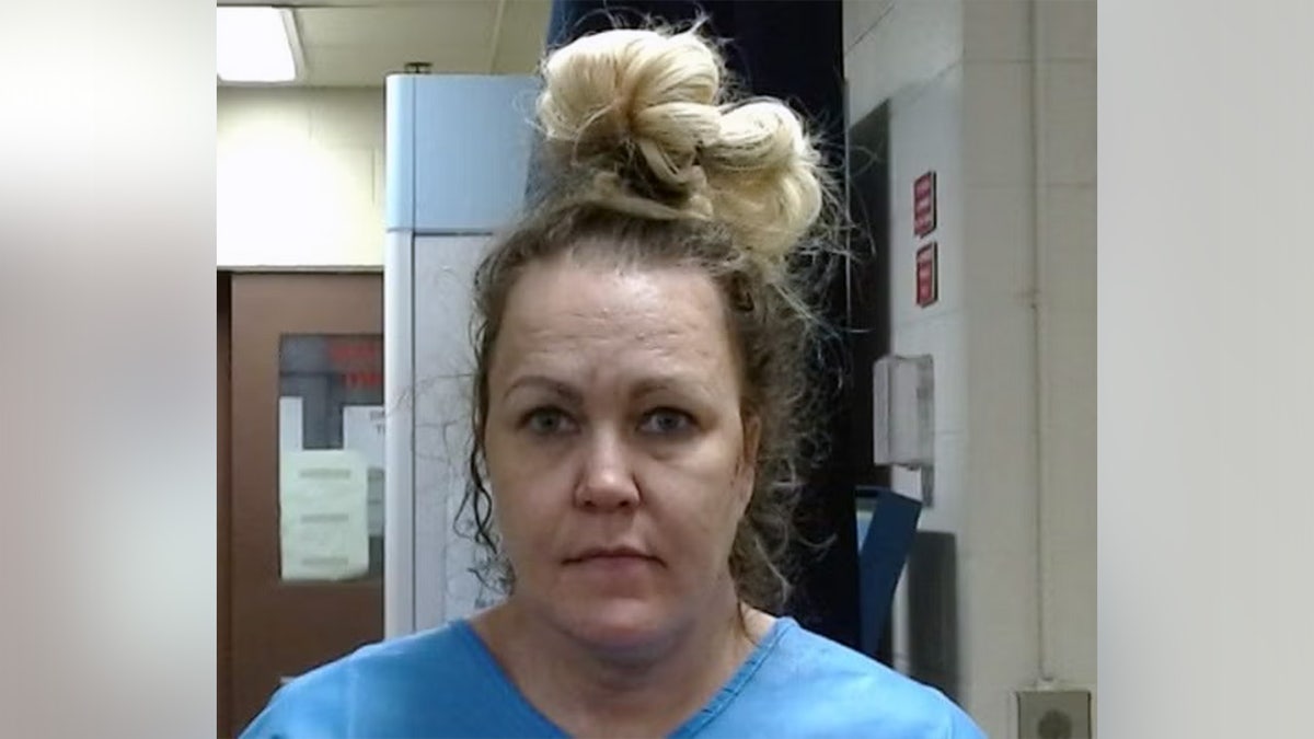 Angelynn "Angie" Mock in her booking photo in Kansas.