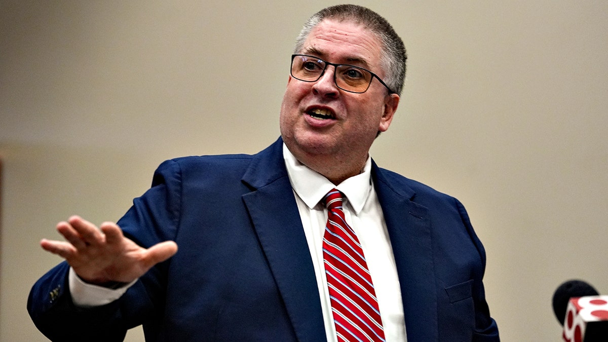 Boone County Prosecutor Kent Eastwood gestures while speaking