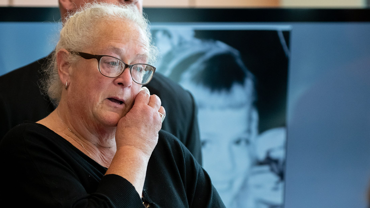 Kay Talanca speaks at a news conference