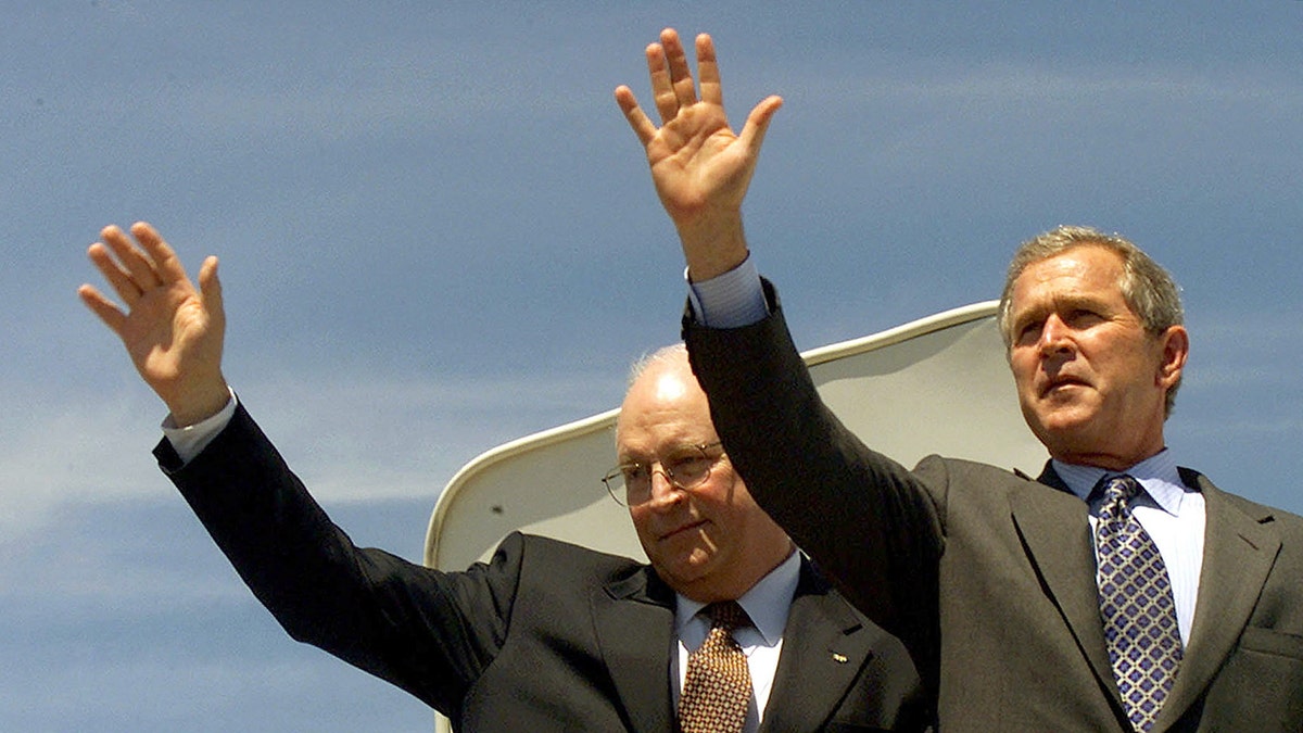 Dick Cheney and George W. Bush waving
