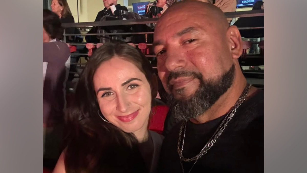 Jason Elola and a woman at Levi stadium