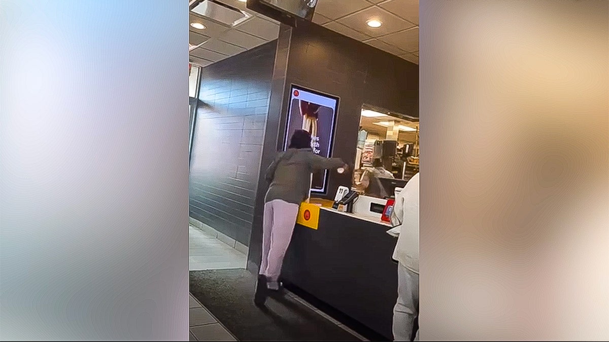 Woman throws coffee at the McDonald's manager.