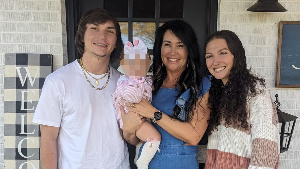 Tyler weaver standing on the left in a group photo with his mother, sister and niece