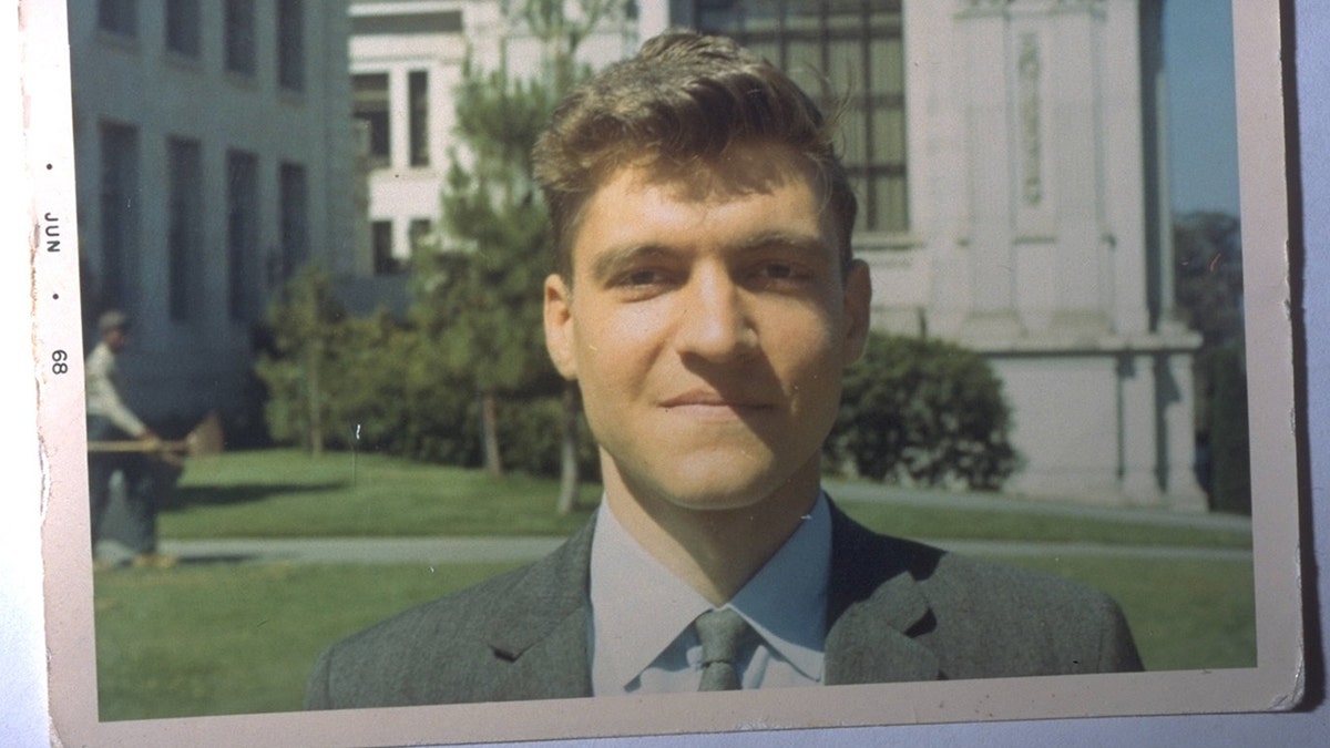 Ted Kaczynski stands outside the University of California
