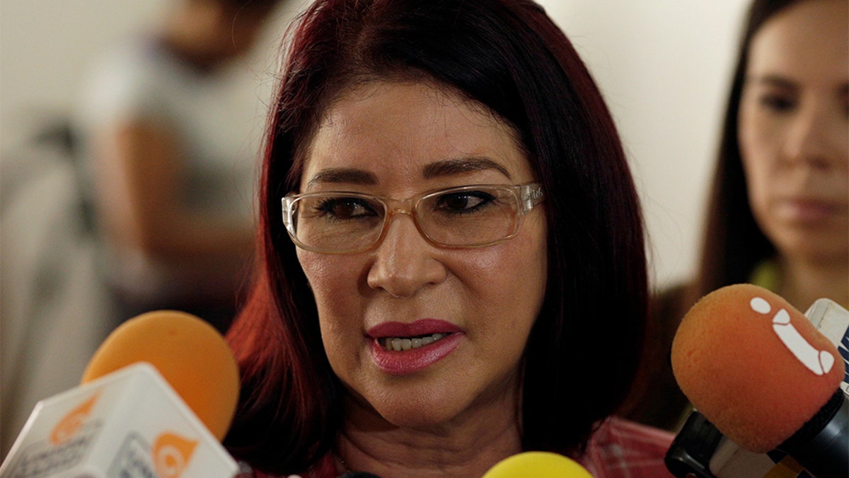 Cilia Flores, wife of Venezuela's President Nicolas Maduro, talks to the media during a simulation of the government's official July 30 vote for a new assembly, in Caracas, Venezuela July 16, 2017. Marco Bello/ Reuters
