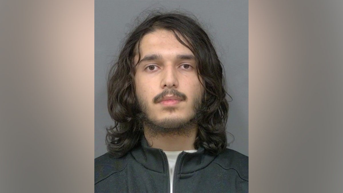 A mugshot of Fahad Sadaat