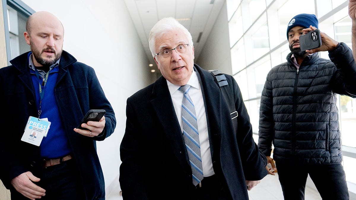 Joseph A. Simon talks to media