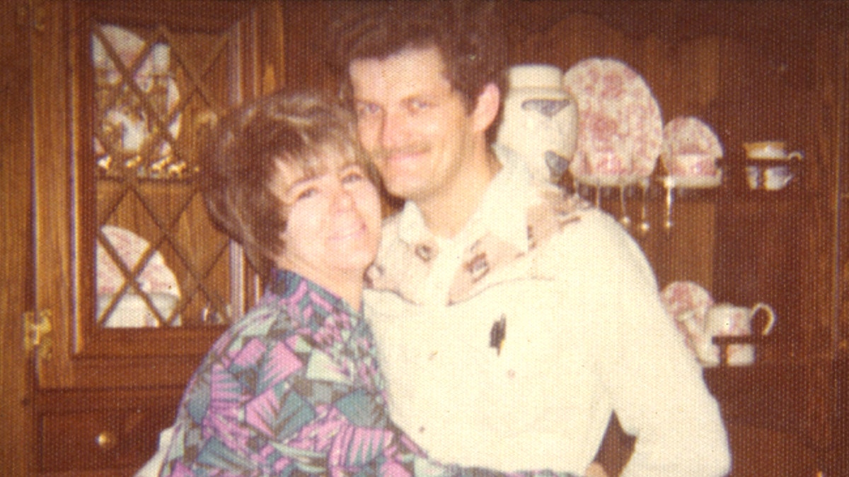 Dorothy Carroll and Richard Darress embracing each other in a family photos from the 1960s.