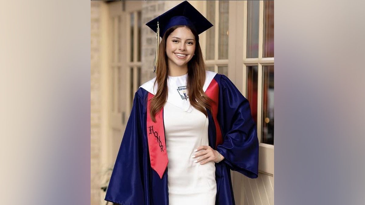 Camila Olmos in her graduation cap and gown