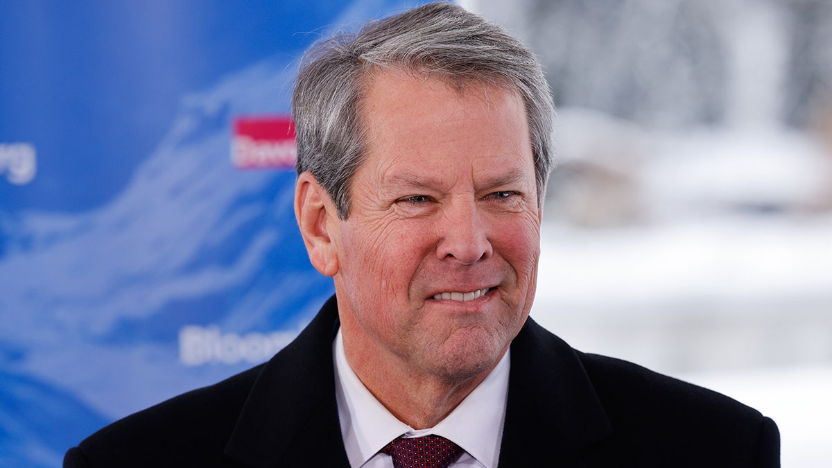 Gov. Brian Kemp reacts during World Economic Forum in Davos, Switzerland