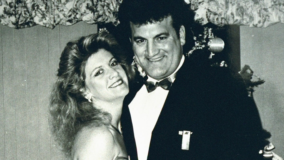 Mary Jo Buttafuoco smiling with Joey Buttafuoco in a tux.