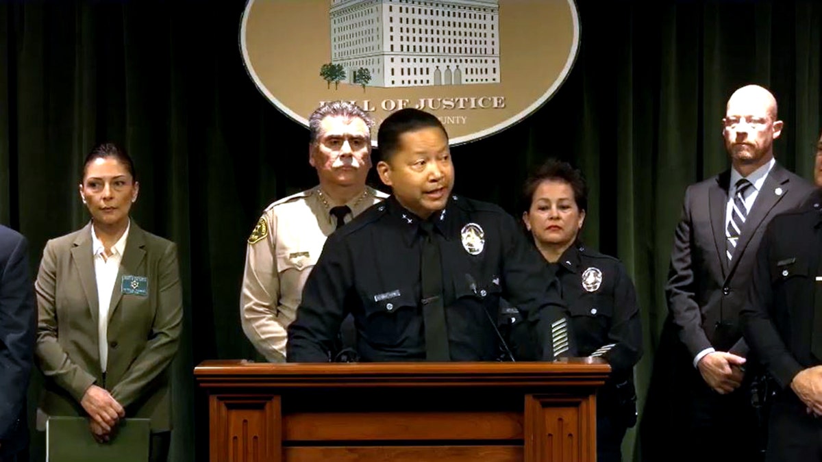 LAPD Deputy Chief Alan Hamilton speaking to reporters