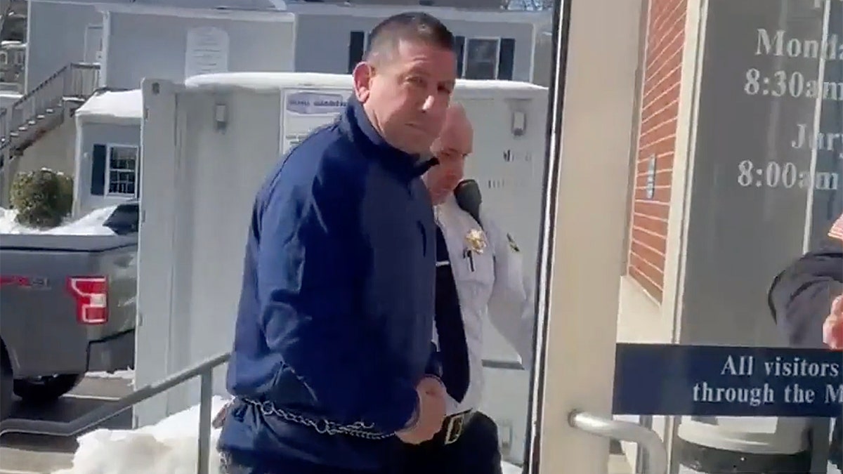 Scott Marino arrives at Woburn District Court.