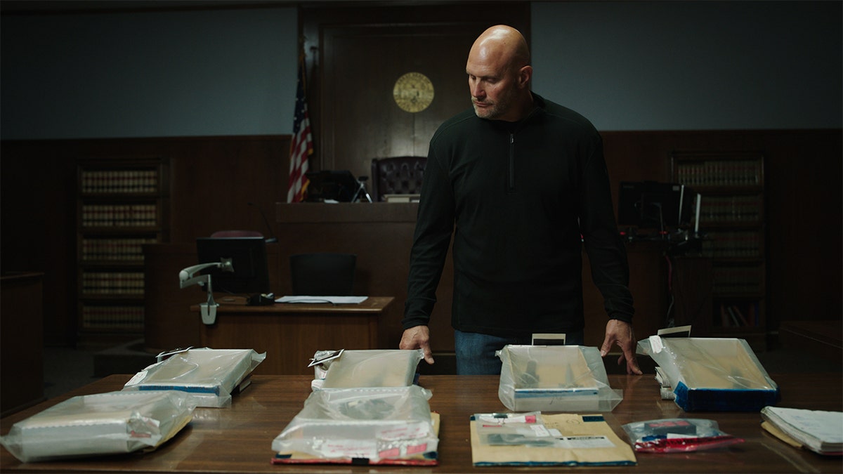 Police captain John Ganske with evidence.