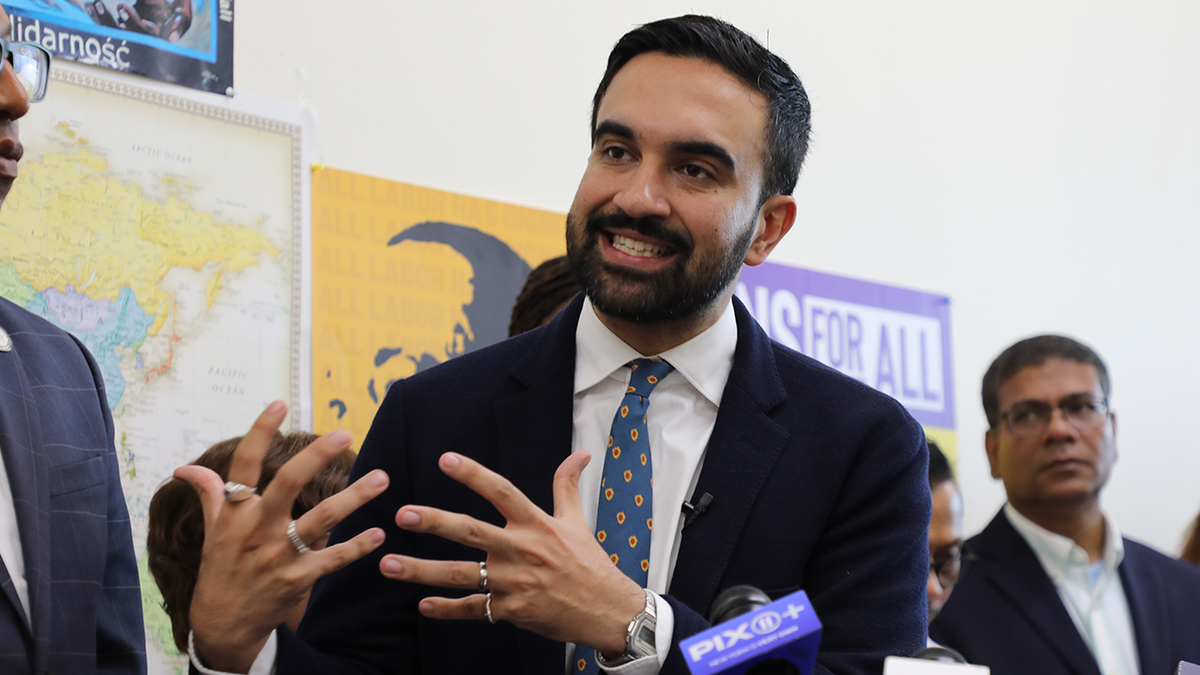 New York City Democratic mayoral candidate Zohran Mamdani speaking at an outdoor event in Queens
